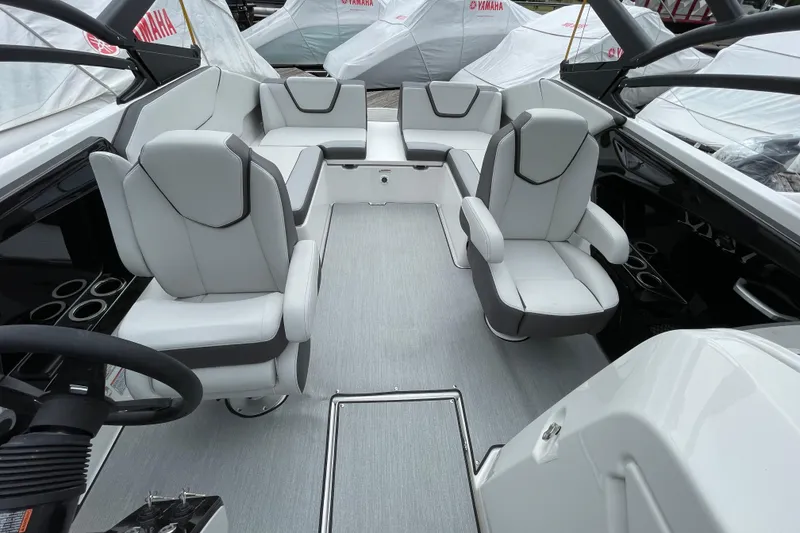 Slide: The Image of 2026 Yamaha AR250 boat interior with modern seating and sleek design. - 8