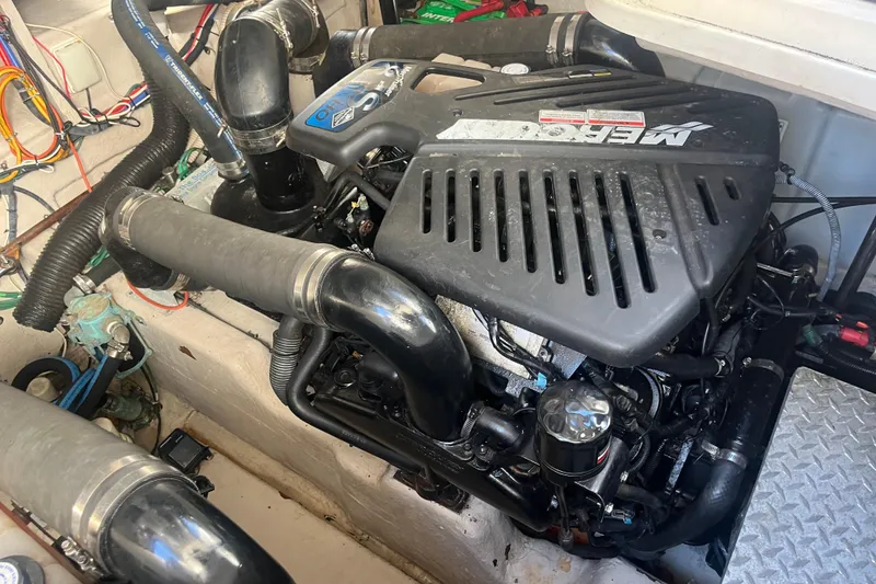 Slide: The Image of Engine compartment of a 2007 Sea Ray 38 Sundancer boat, featuring a MerCruiser engine. - 16