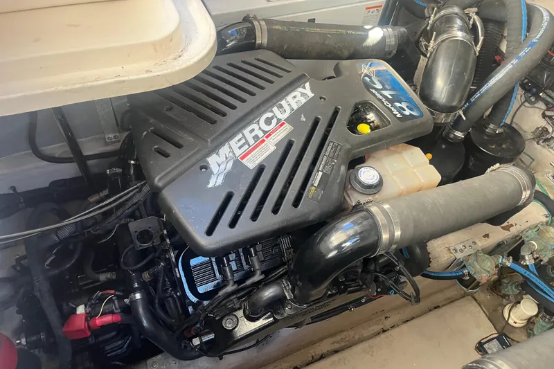 Slide: The Image of Engine compartment of a 2007 Sea Ray 38 Sundancer with Mercury engine. - 17