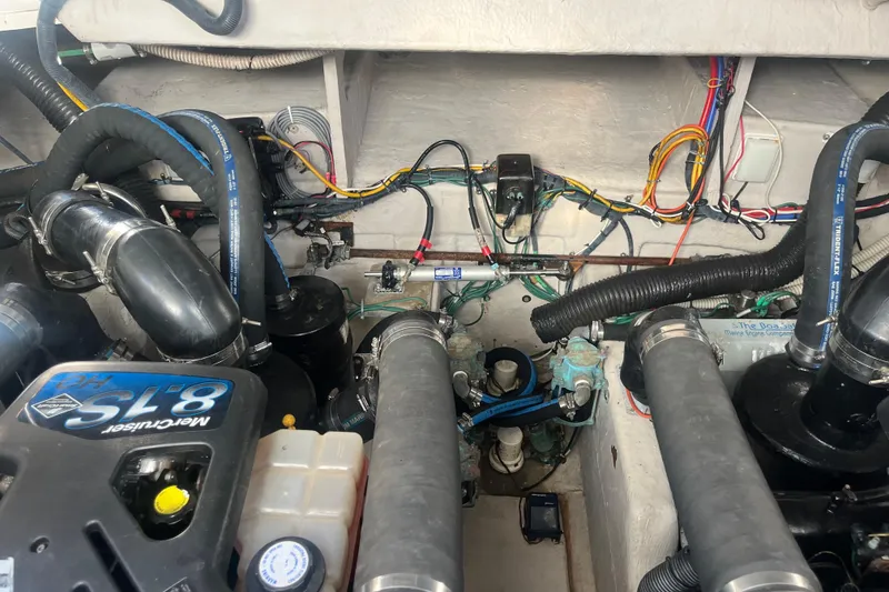 Slide: The Image of Engine compartment of a 2007 Sea Ray 38 Sundancer with MerCruiser 8.1S engine components. - 21
