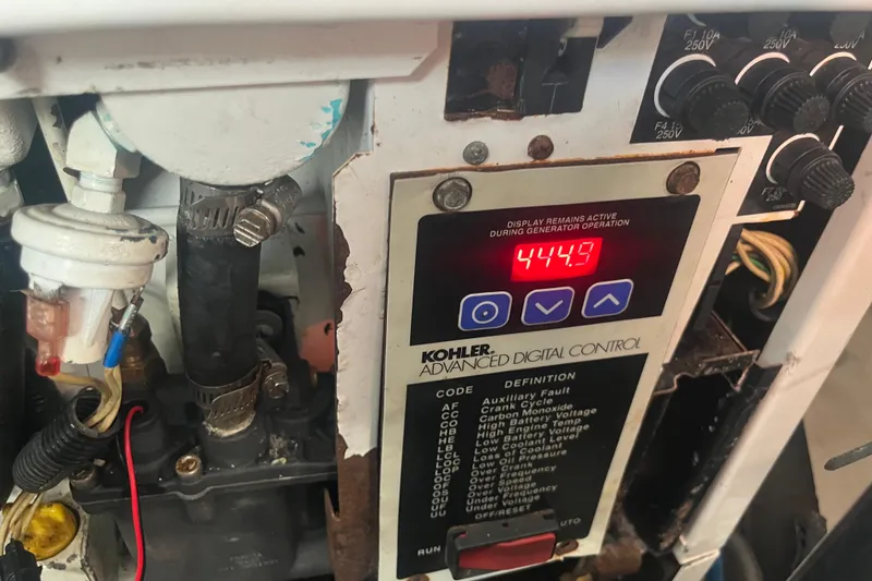 Slide: The Image of Kohler digital control panel on 2007 Sea Ray 38 Sundancer, displaying 444.9. - 22