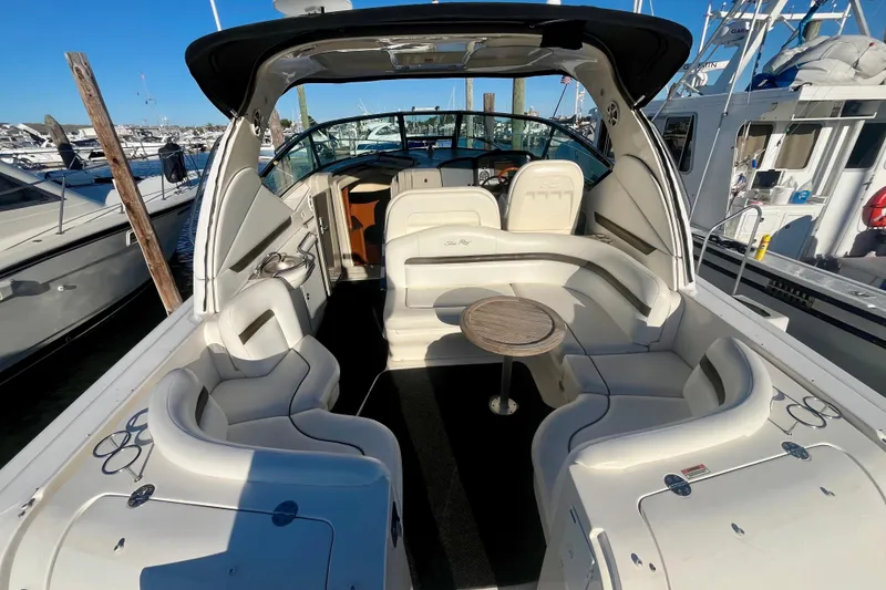 Slide: The Image of 2007 Sea Ray 38 Sundancer yacht with spacious seating and elegant interior design. - 3