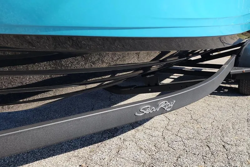 Slide: The Image of 2022 Sea Ray SPX 230 Outboard boat on trailer, close-up view. - 25