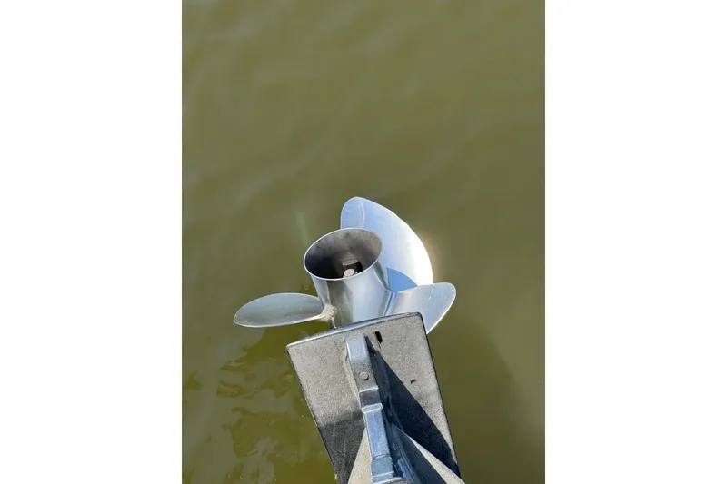 Slide: The Image of Propeller of 2022 Sea Ray SPX 230 Outboard boat in water. - 27