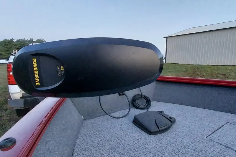 Slide: The Image of 2021 Tracker Super Guide V-16 SC boat with PowerDrive motor on deck. - 12