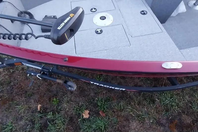 Slide: The Image of 2021 Tracker Super Guide V-16 SC boat with Minn Kota trolling motor. - 14