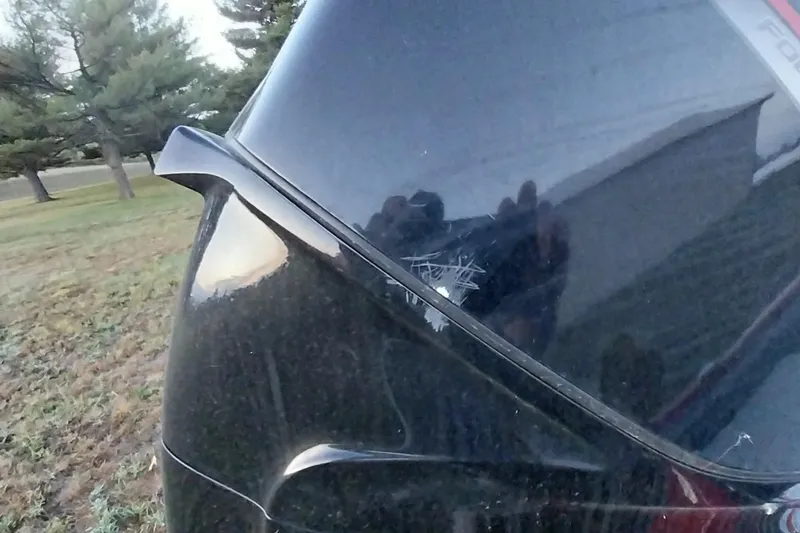 Slide: The Image of 2021 Tracker Super Guide V-16 SC with visible scratches on the rear. - 32