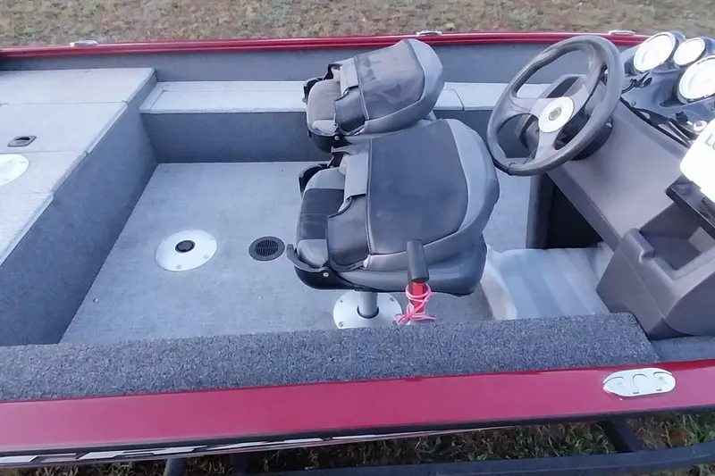 Slide: The Image of 2021 Tracker Super Guide V-16 SC boat interior with dual seats and steering console. - 46