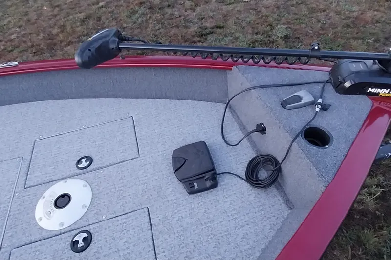 Slide: The Image of 2021 Tracker Super Guide V-16 SC boat deck with Minn Kota trolling motor. - 5