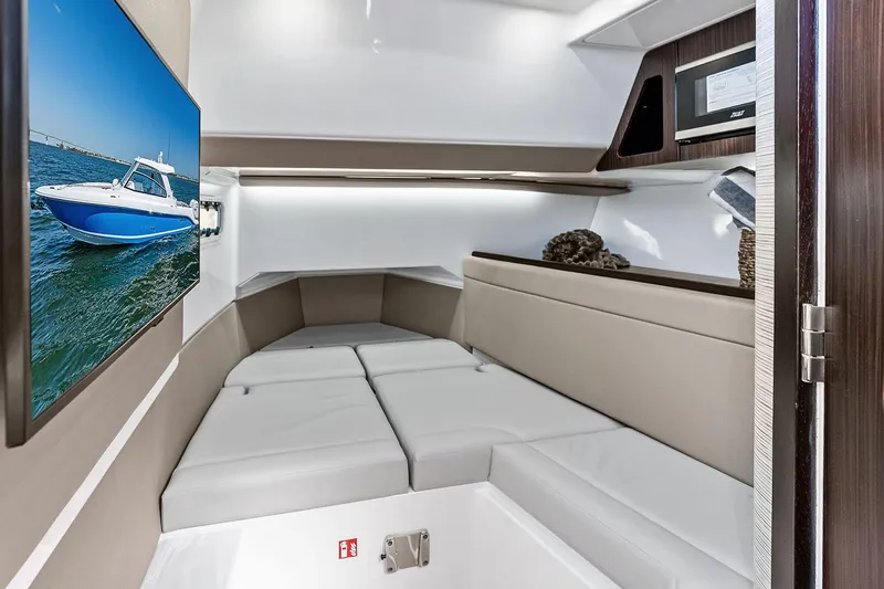 Slide: The Image of Manufacturer Provided Image: Luxurious interior of 2025 Everglades 367 CX boat with modern amenities and comfortable seating. - 9