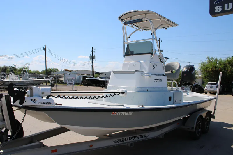 Slide: The Image of 2020 Shoalwater 21 Catamaran on trailer, featuring Minn Kota trolling motor. - 10