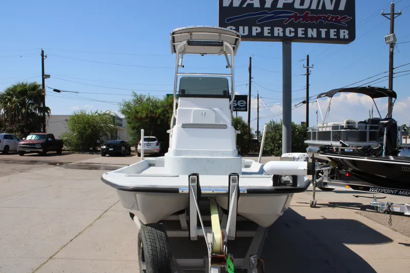 Slide: The Image of 2020 Shoalwater 21 Catamaran at Waypoint Marine Supercenter, parked on a trailer. - 9