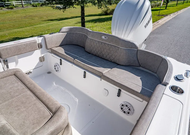 Slide: The Image of 2026 Sea Hunt Ultra 245 SE boat interior with cushioned seating and modern design. - 6