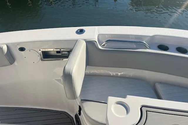 Slide: The Image of 2023 Sea Fox 228 Commander boat interior with seating and cup holders. - 11