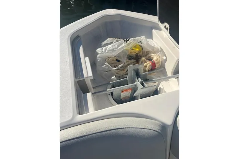 Slide: The Image of 2023 Sea Fox 228 Commander anchor storage with ropes and equipment. - 12