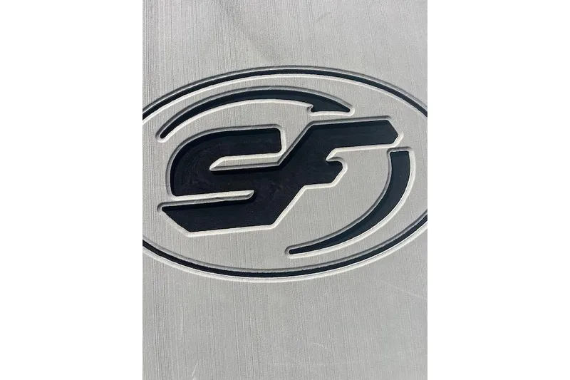 Slide: The Image of Sea Fox 228 Commander 2023 logo on a metallic surface. - 13