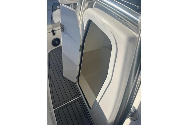 Slide: The Image of Open storage compartment on 2023 Sea Fox 228 Commander boat. - 17