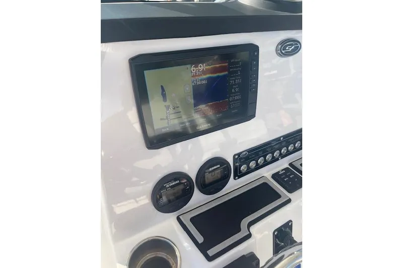 Slide: The Image of Dashboard of 2023 Sea Fox 228 Commander with Garmin display and controls. - 18