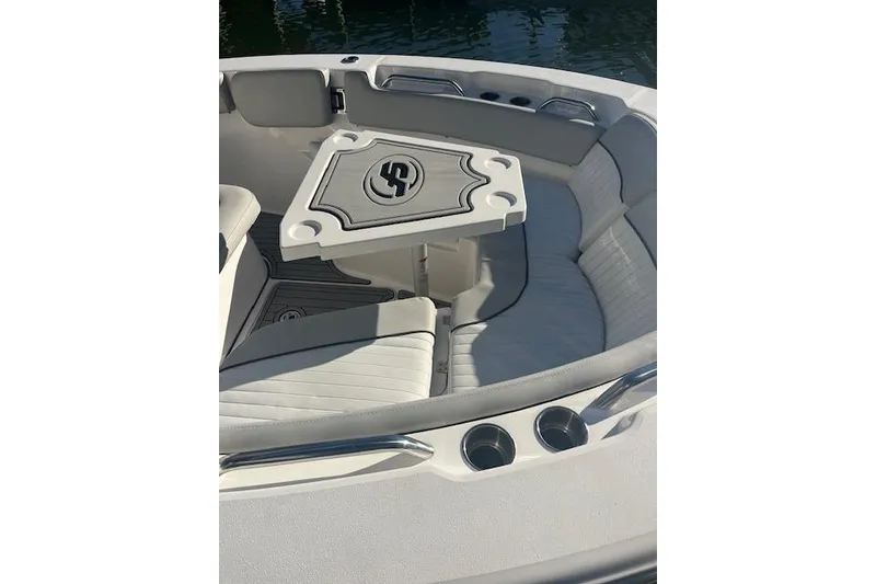 Slide: The Image of 2023 Sea Fox 228 Commander boat interior with seating and table. - 22