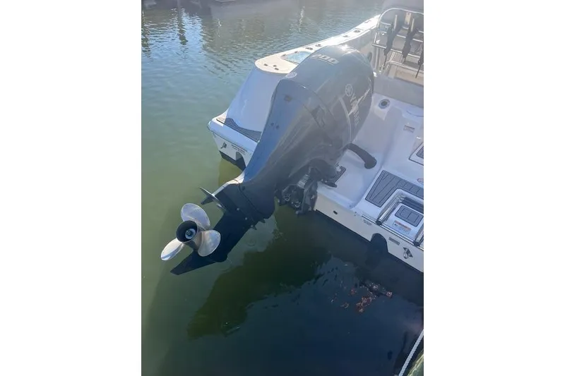 Slide: The Image of 2023 Sea Fox 228 Commander boat with outboard motor in calm water. - 5