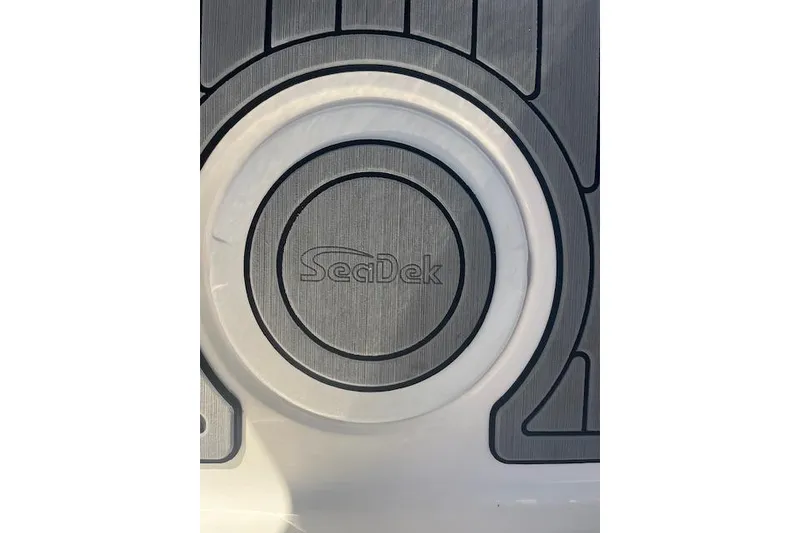 Slide: The Image of SeaDek logo on 2023 Sea Fox 228 Commander boat flooring. - 8