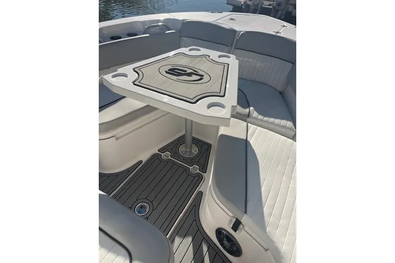 Slide: The Image of 2023 Sea Fox 228 Commander boat interior with seating and table. - 9