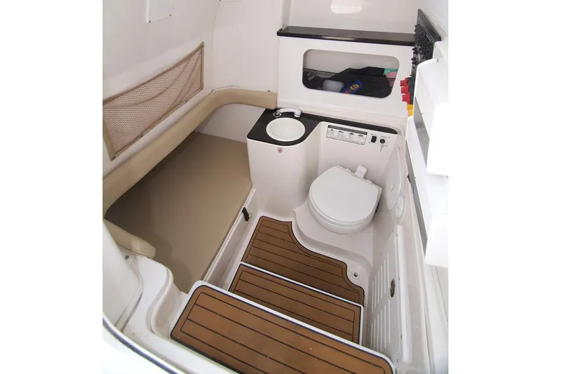 Slide: The Image of 2017 Sea Fox 328 Commander boat interior with seating and storage. - 18