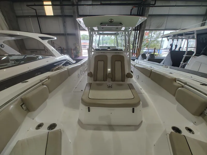 Slide: The Image of 2017 Sea Fox 328 Commander boat interior with plush seating and steering wheel. - 25