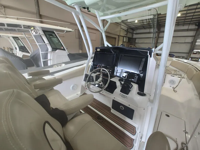 Slide: The Image of 2017 Sea Fox 328 Commander boat interior with sink and storage area. - 30