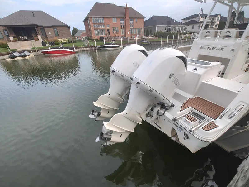 Slide: The Image of 2017 Sea Fox 328 Commander boat docked in a residential marina. - 8