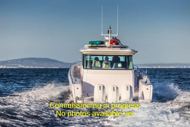 Slide: The Image of 2024 Axopar 45 XC Cross Cabin BRABUS Trim on water, commissioning in progress. - 7
