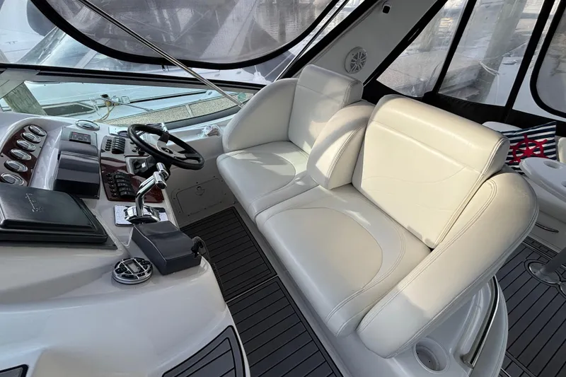 Slide: The Image of 1998 Silverton 360 Express boat interior with windshield and deck view. - 12