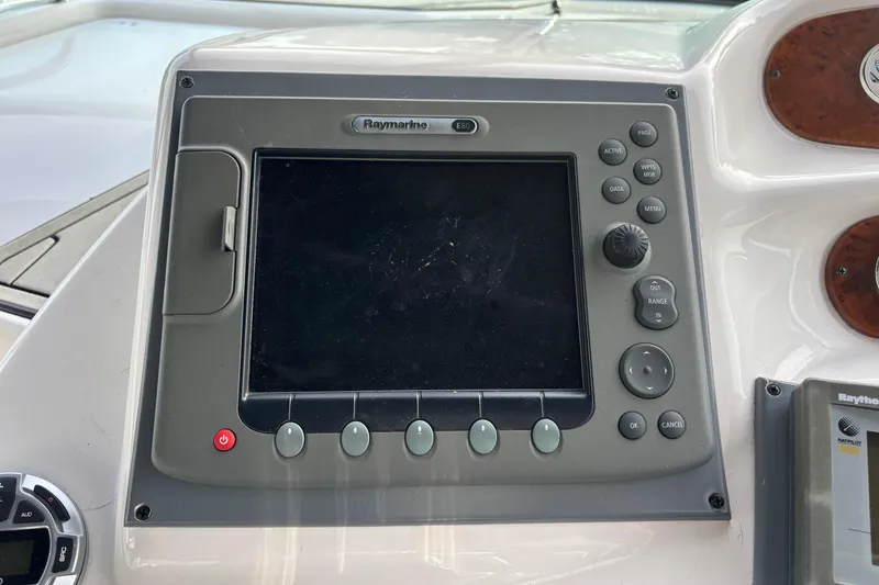 Slide: The Image of Interior of 1998 Silverton 360 Express yacht with cozy seating and modern amenities. - 17