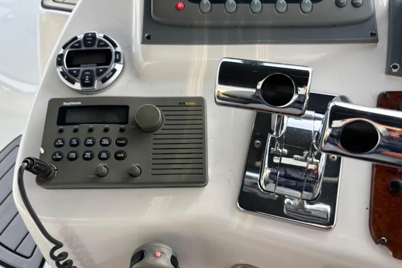 Slide: The Image of 1998 Silverton 360 Express yacht interior kitchen with appliances and cozy sleeping area. - 19