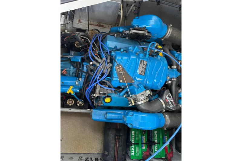 Slide: The Image of 1998 Silverton 360 Express kitchen area with stove, microwave, and countertop. - 21