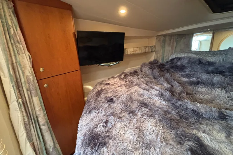 Slide: The Image of Engine compartment of a 1998 Silverton 360 Express with blue components and wiring. - 37