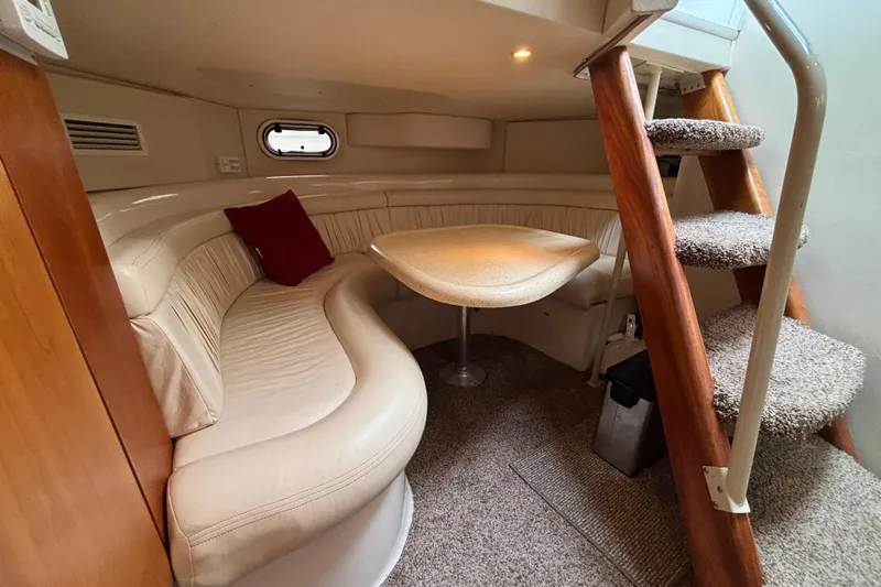 Slide: The Image of 1998 Silverton 360 Express engine compartment with blue engine and Interstate batteries. - 40