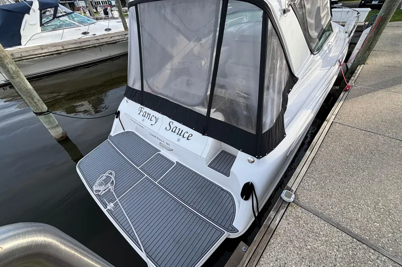 Slide: The Image of Luxurious 1998 Silverton 360 Express cabin with plush bedding and modern amenities. - 5