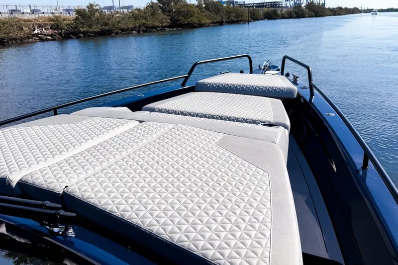 Slide: The Image of The image shows the deck of a 2024 BRABUS Shadow 1000 ST with sleek upholstery. - 37
