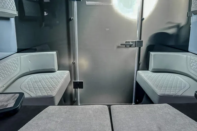 Slide: The Image of Interior of the BRABUS Shadow 1000 ST featuring sleek white seating and modern details. - 43