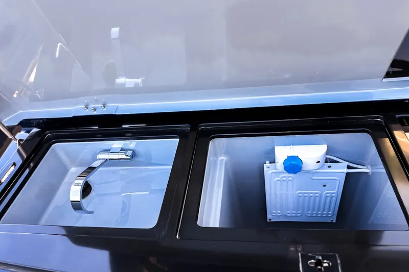 Slide: The Image of The 2024 BRABUS Shadow 1000 ST features a modern sink and a refrigerator. - 20