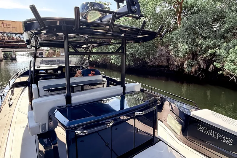 Slide: The Image of The image shows a luxury boat cruising on a calm river, surrounded by lush greenery. - 16
