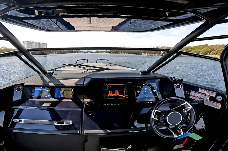 Slide: The Image of The cockpit of the 2024 BRABUS Shadow 1000 ST features modern instruments and sleek design. - 26