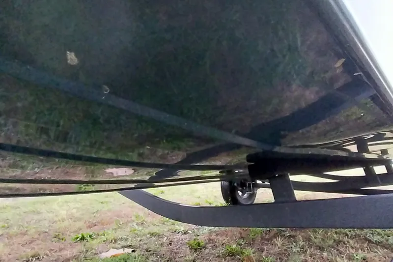 Slide: The Image of Underside view of 2024 Ranger RT198P boat on trailer, showcasing hull design. - 10