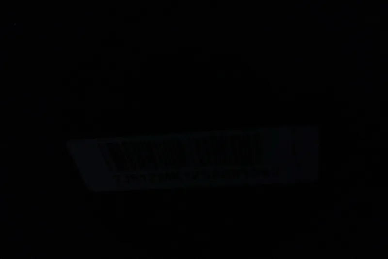 Slide: The Image of Dark image with an indistinct label, possibly related to Ranger RT198P 2024 model. - 14