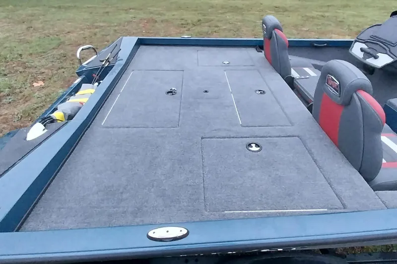 Slide: The Image of 2024 Ranger RT198P boat deck with storage compartments and seating. - 20