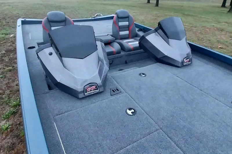 Slide: The Image of 2024 Ranger RT198P boat interior with dual seats and carpeted deck. - 31