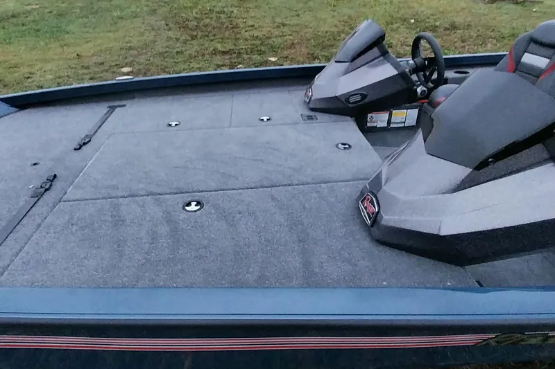 Slide: The Image of 2024 Ranger RT198P boat interior with dual consoles and spacious deck. - 45