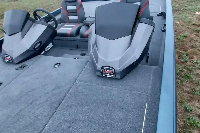 Slide: The Image of 2024 Ranger RT198P boat interior with dual seats and steering console. - 46