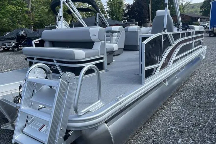 Slide: The Image of 2025 Bennington SLJSR pontoon boat with sleek design and comfortable seating. - 6